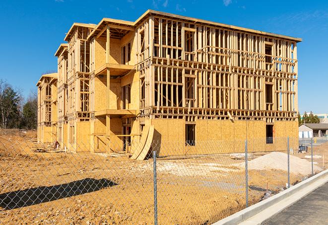 a snapshot of temporary chain link fences protecting a large construction project from unauthorized access in Etters